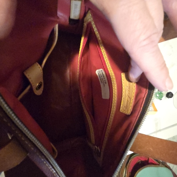 Dooney and Burke burgundy purse medium size. - Picture 3 of 5